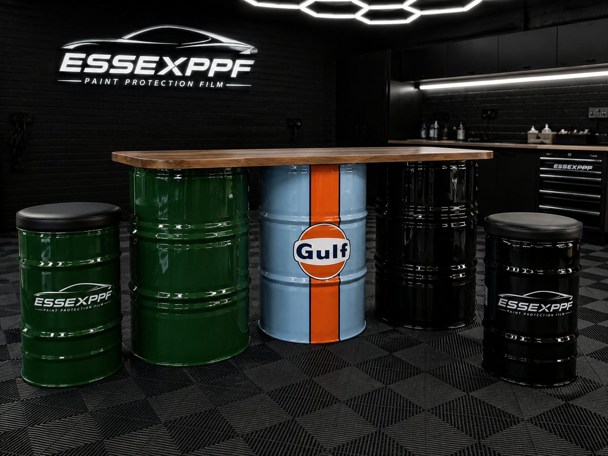 Painted oil drum bar table and stools in Gulf, green and black finishes
