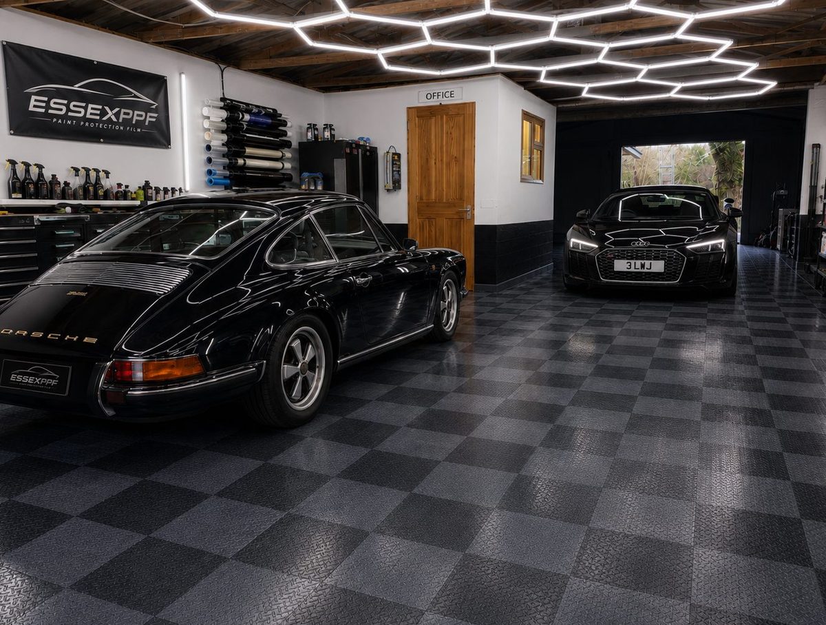 Classic Porsche 911 and Audi R8 inside the Essex PPF workshop